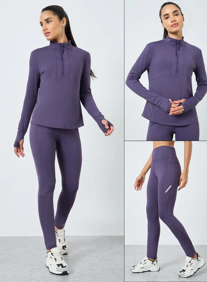 Styli Active Half Zip Up Multi Panel Seam Long Sleeve Top and Reflector Stripe Calf Mesh 7/8 Leggings Set