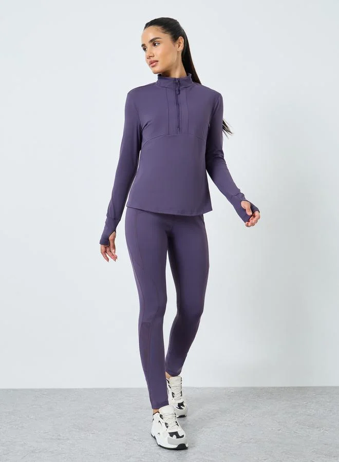 Styli Active Half Zip Up Multi Panel Seam Long Sleeve Top and Reflector Stripe Calf Mesh 7/8 Leggings Set