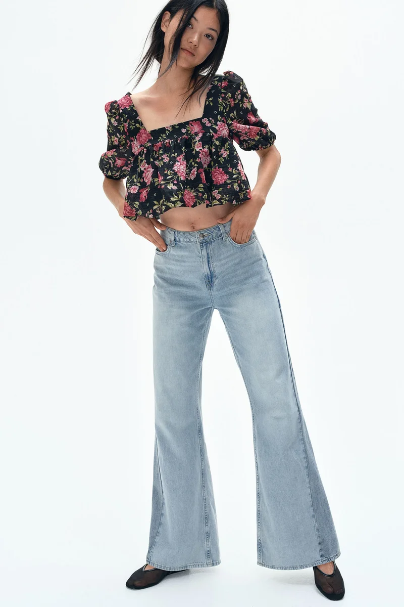 اتش اند ام جينز بخصر عالي وحافة واسعة من خامة ناعمة