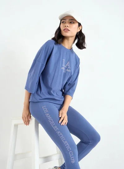 Styli Women Blue Printed Oversized T-Shirt and Leggings Set