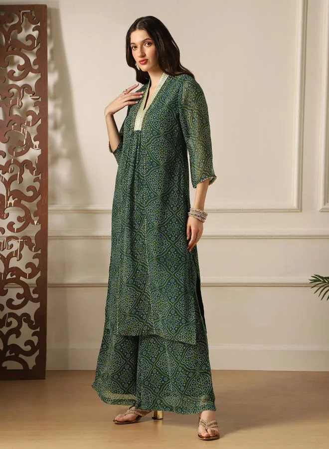 جلو باص طقم كورتا شيفون بطبعة بنديني وتطريز زاري مع بنطال واسع