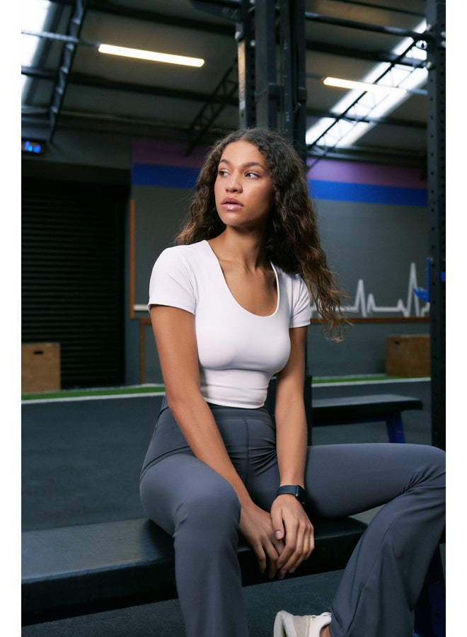 trendyol White 2 Layers Padded Sports Bra Pool Neck Knitted Sports Top/Blouse THMSS24BZ00003 - Image 1