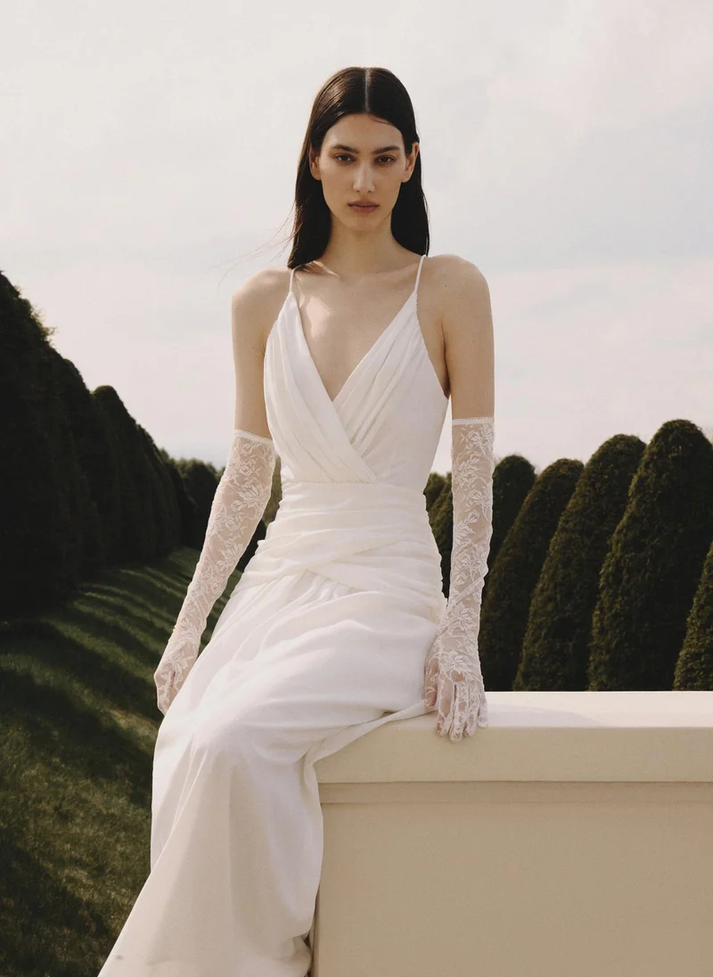 Maxi dress with thin straps and draping at the waist