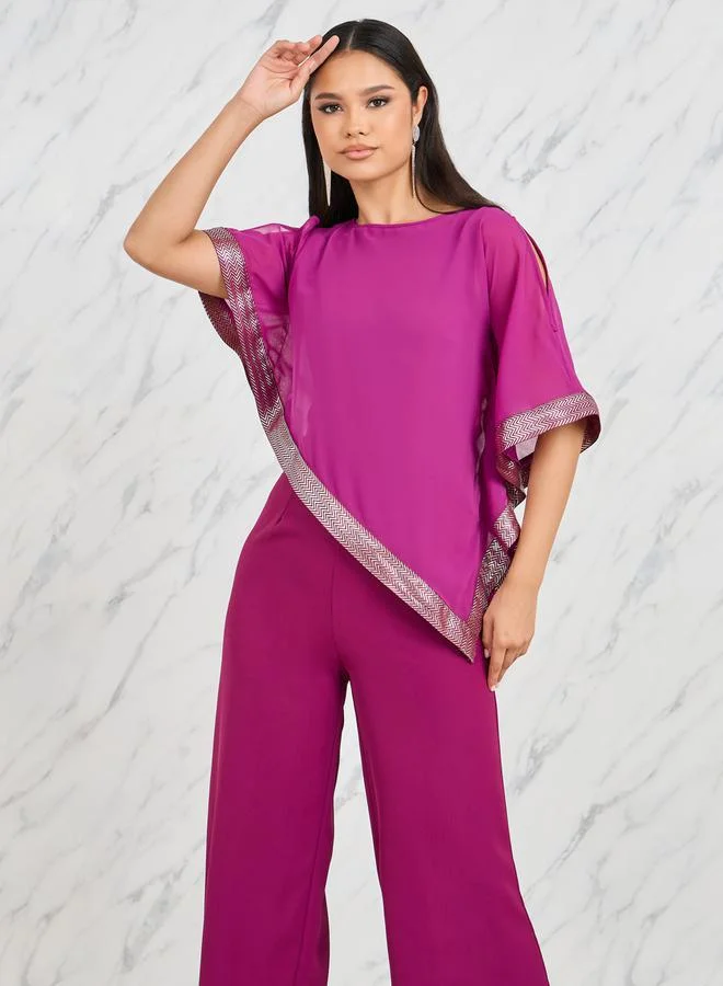 Styli Lace Trim Asymmetric Hem Cape Overlay Wide Leg Jumpsuit
