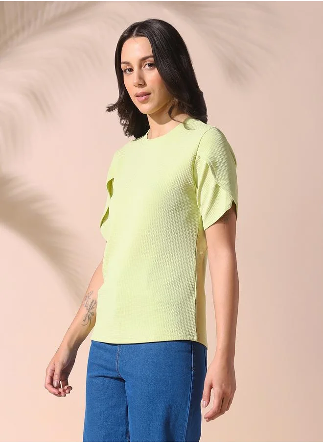 دينيس لينغو Women apple green regular fit textured half sleeves t-shirt 100% poly top with pull over closure- your next go-to for effortless flair.