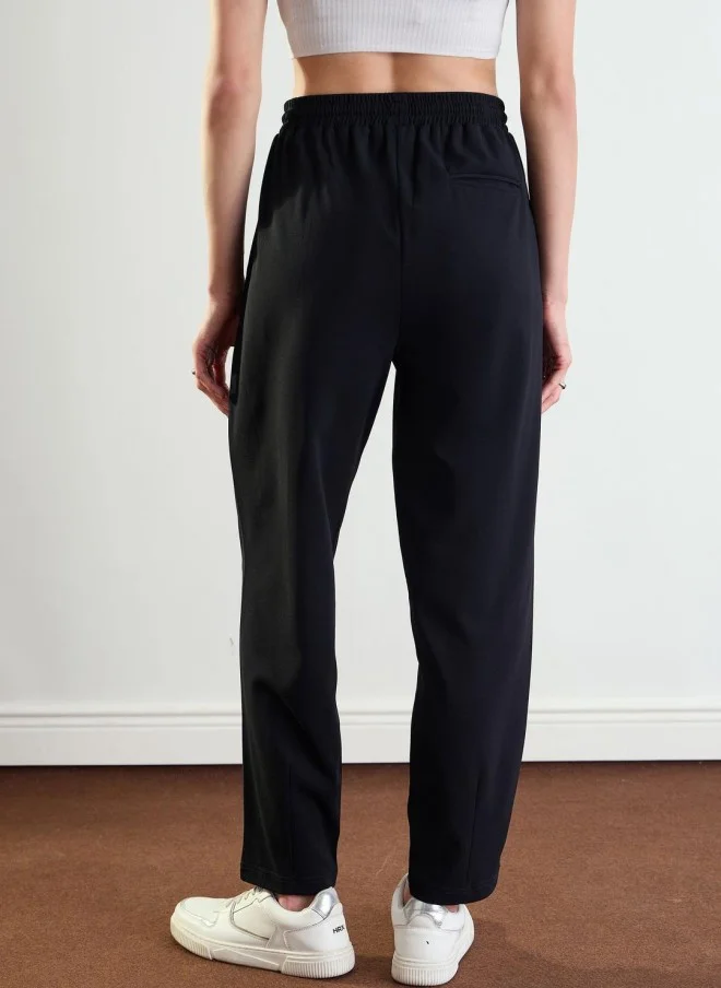 ساسافراس High-Rise Black Jogger Trousers for Women