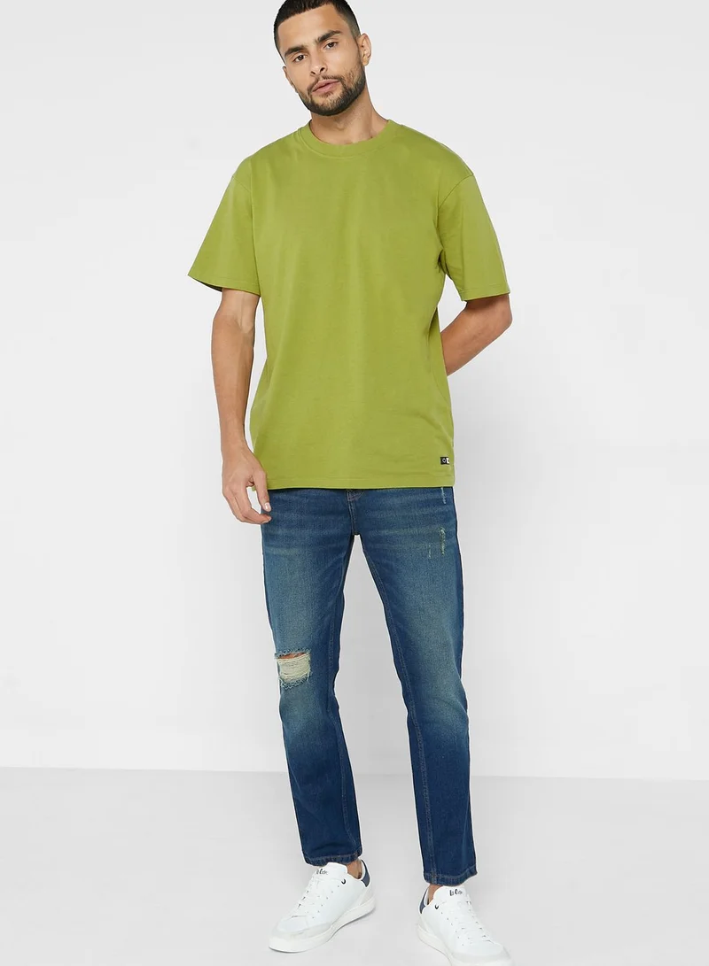 Seventy Five Tapered Cropped Fit Rip Detail Jean