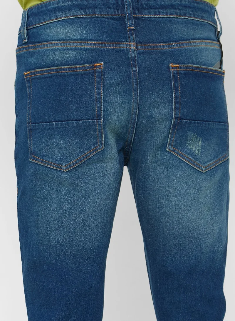 Seventy Five Tapered Cropped Fit Rip Detail Jean
