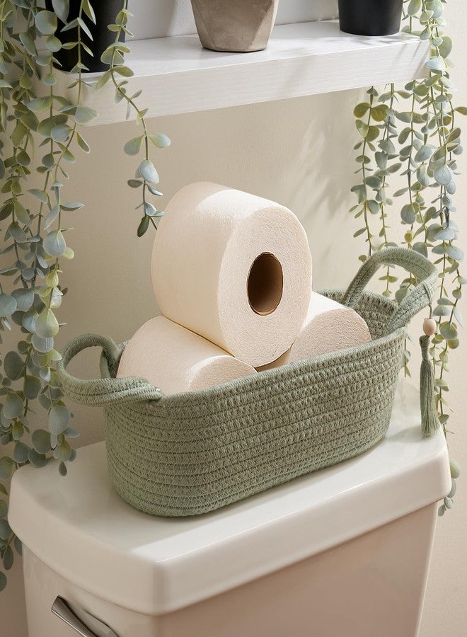 KIBAGA Decorative Toilet Paper Basket - Beautiful Bathroom Organizer for Toilet Tank Storage Decor - Boho Cotton Rope Bin with Tassel for Bathroom Accessories and as Shelf Decor (sage Green) - Image 1