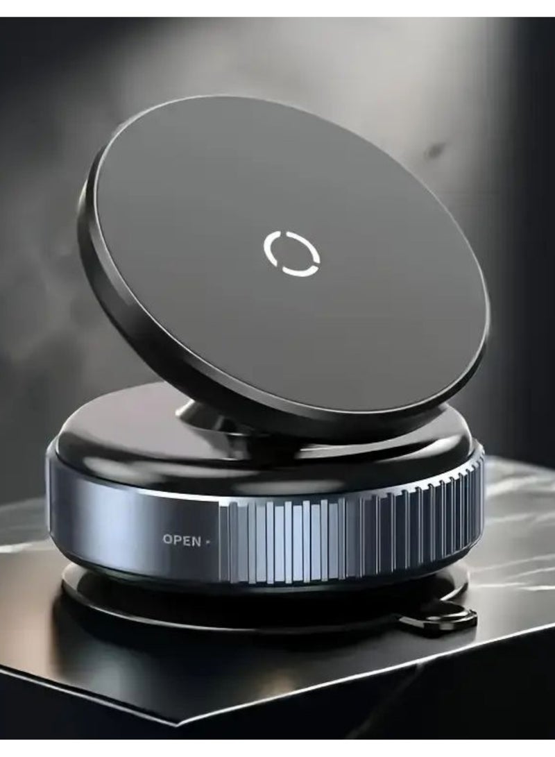 Strong magnetic car phone holder with 360 degree rotation. Its features: You can install it in any convenient place for you in the car without adhesive or glue. It is fixed by strong suction. After placing it, rotate the disc to increase the security of the installation. Therefore, do not worry about vibration, rough or mountainous road conditions, artificial bumps, turns, or sudden braking. It is anti-slip and more stable and stable from falling. Also, to remove the holder, it is easy without leaving a trace on the car. Just rotate the disc to open and the holder is removed. Compatible with all smartphones. The color of the holder is black  - Image 2
