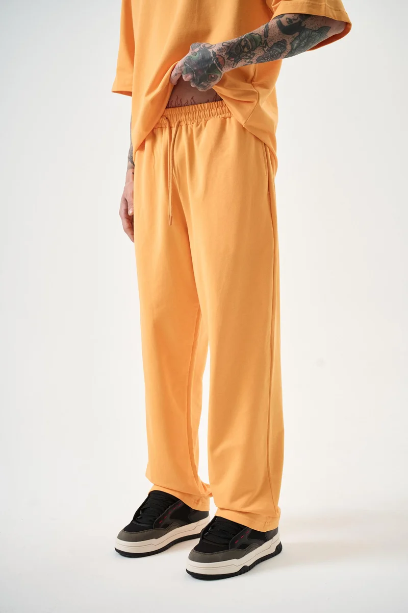 ريسباير بنطلون رياضي رجالي فضفاض أساسي برتقالي