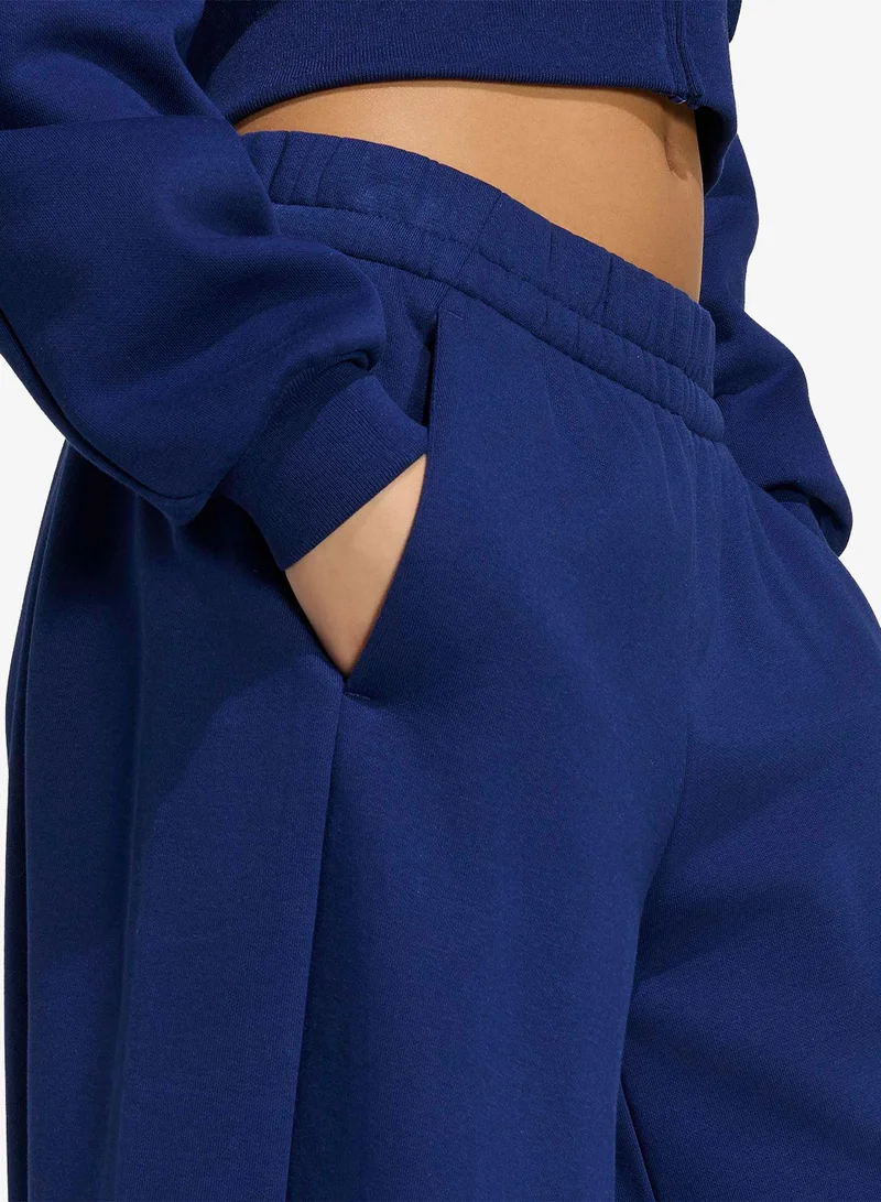 Adidas DKBLUE Essential Contemporary Fleece Barrel Joggers for Women | Best Price UAE