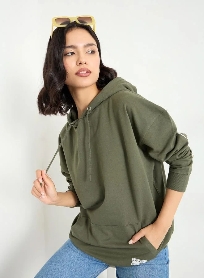Styli  Oversized Longline Sweatshirt with Dropped Shoulder for Women | Best Price UAE