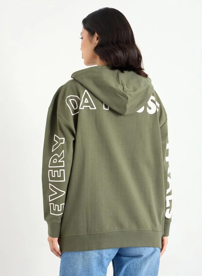 Styli  Oversized Longline Sweatshirt with Dropped Shoulder for Women | Best Price UAE
