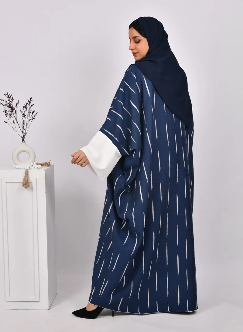 HAWRAA ABAYA Navy blue wide sleeve abaya with white stripes and white dress