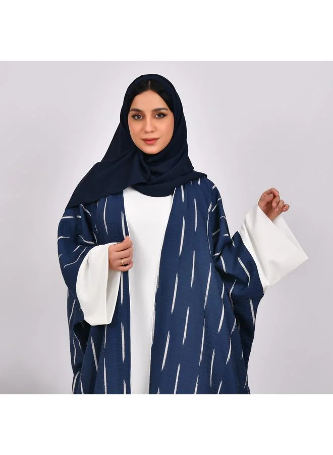 HAWRAA ABAYA Navy blue wide sleeve abaya with white stripes and white dress
