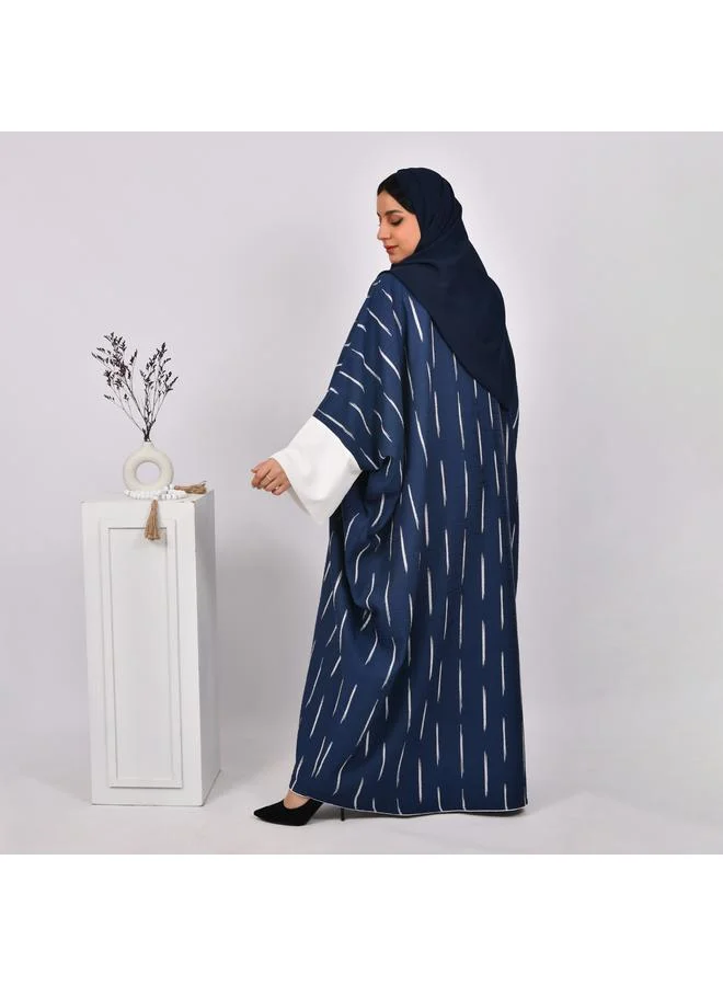 HAWRAA ABAYA Navy blue wide sleeve abaya with white stripes and white dress