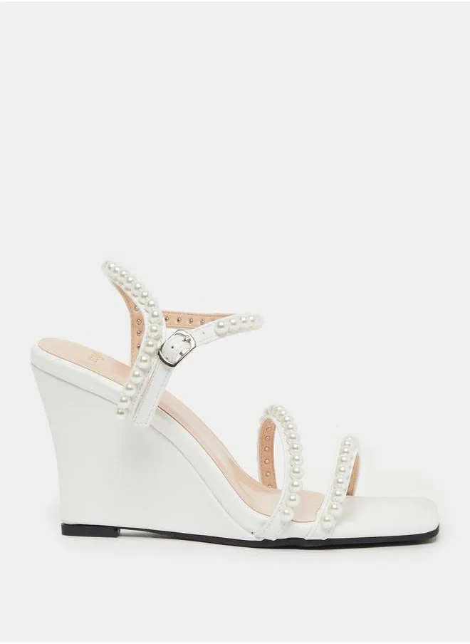 ستايلي Pearl Embellished Ankle Strap Wedge Heel Sandals