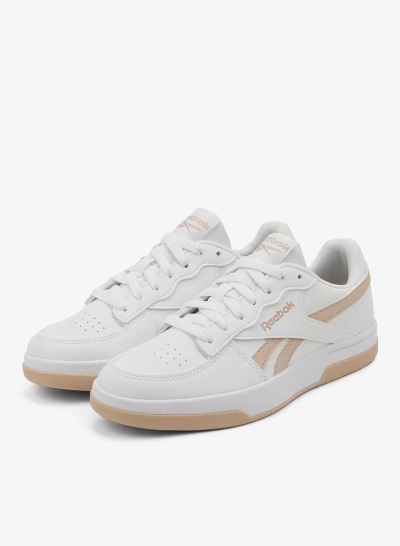 ريبوك Reebok Prime Serve sneakers are a stylish and comfortable solution for an everyday look and light sports activity. These sneakers embody a combination of classic design and modern technology, providing you with comfort at every step. The upper made of high-quality materials provides good air circulation, and the minimalist design with signature Reebok details gives the model an elegant and modern look. The inner part comfortably hugs the foot, ensuring a comfortable fit and support. The sole is designed with ergonomics and cushioning in mind, providing excellent stability and traction on different surfaces. Reebok Prime Serve are ideal for both city walks and casual meetings with friends. They easily fit into any wardrobe, complementing both sports looks and everyday outfits.