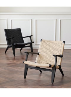 A living room chair made of beech wood and rattan with a streamlined design and a distinctive black color - pzsku/ZC5AB54E80048E476375FZ/45/_/1739620588/907c77d3-b621-4adf-b373-358856fc5ca5