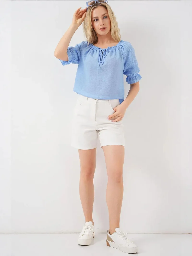 بيغ دارت بلوزة قصيرة بياقة قارب مزخرفة مع تفاصيل كرات فرو