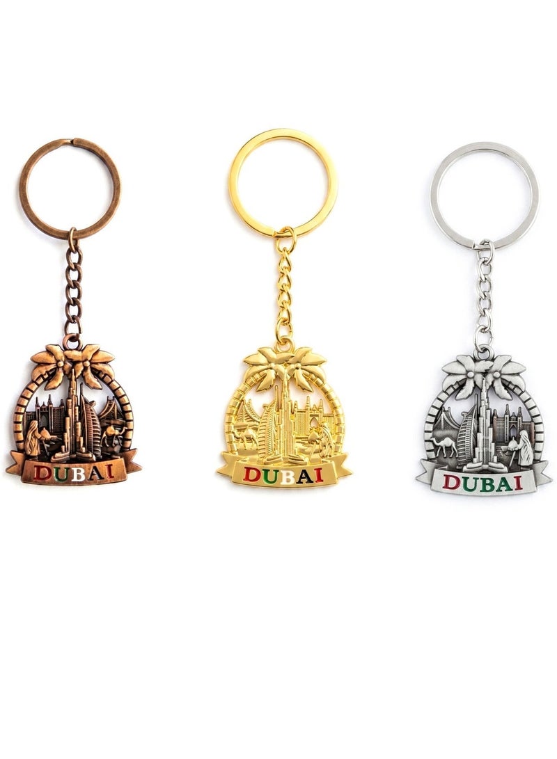 Souvenir Souq Stylish metal keychain 3 pcs  featuring elegant Dubai design with palm tree in three vibrant colors—perfect as a souvenir, gift, or everyday accessory. - Image 1
