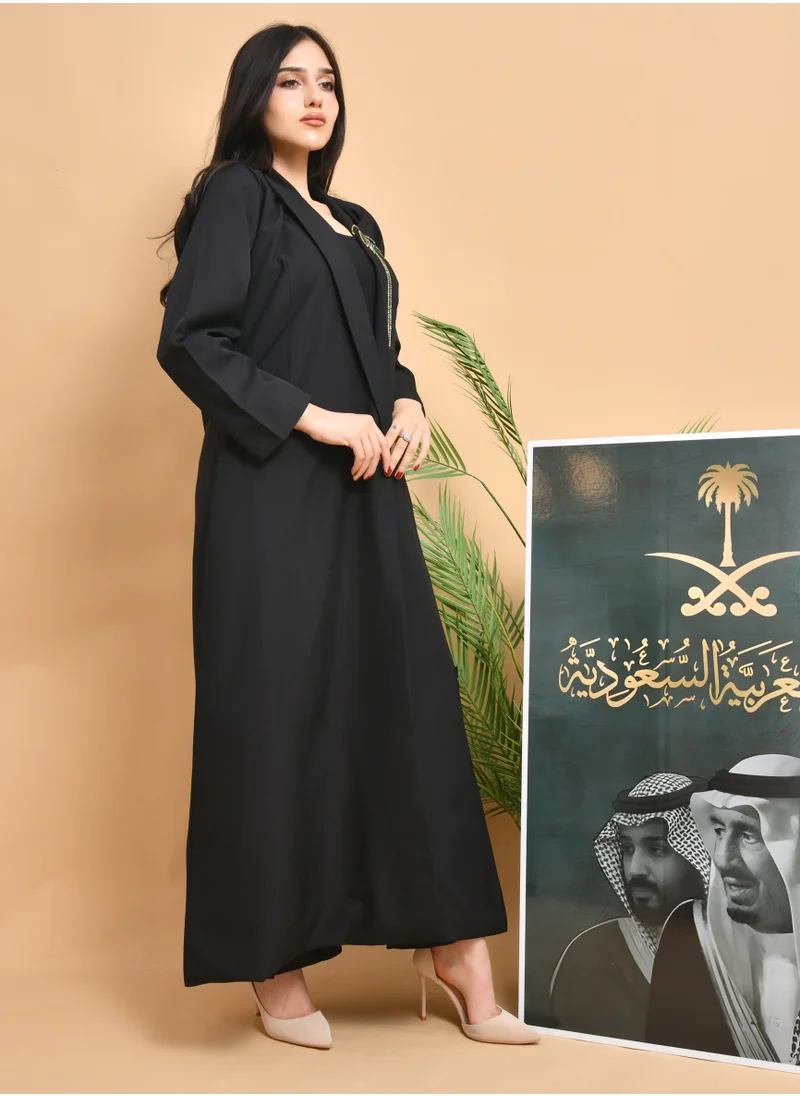 HAWRAA ABAYA A sophisticated black blazer with an inner lining, decorated with a hand check on the collar and prominent pockets