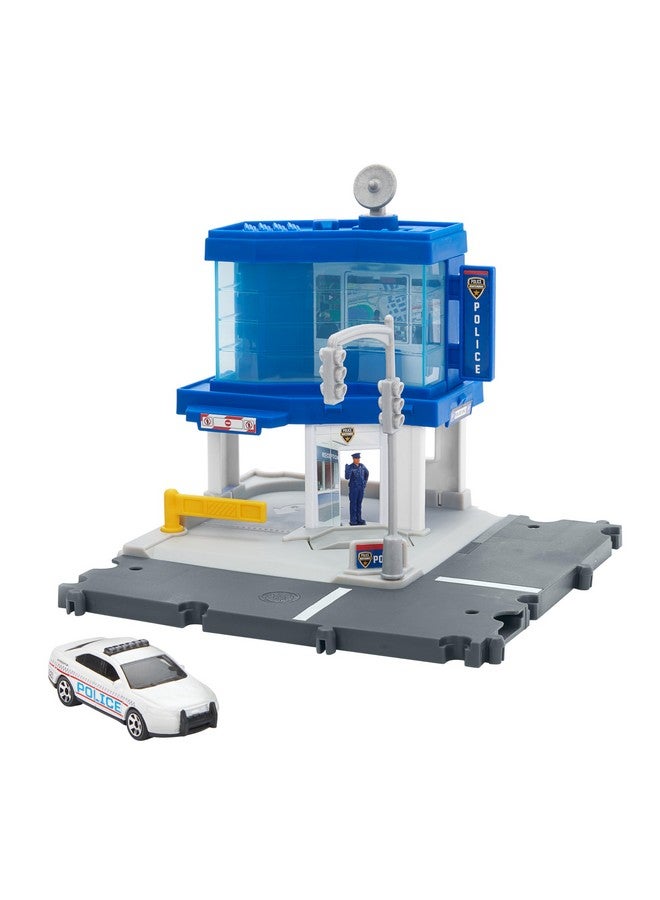 MATCHBOX سيارة لعبة من علبة الثقاب ومجموعة لعب، مركز مرور شرطة السائقين الأبطال مع سيارة شرطة فورد إنترسبتر مقياس 1:64، ميزات تعمل بواسطة الأطفال والسيارات، شخصية متحركة، HRY44 - Image 1