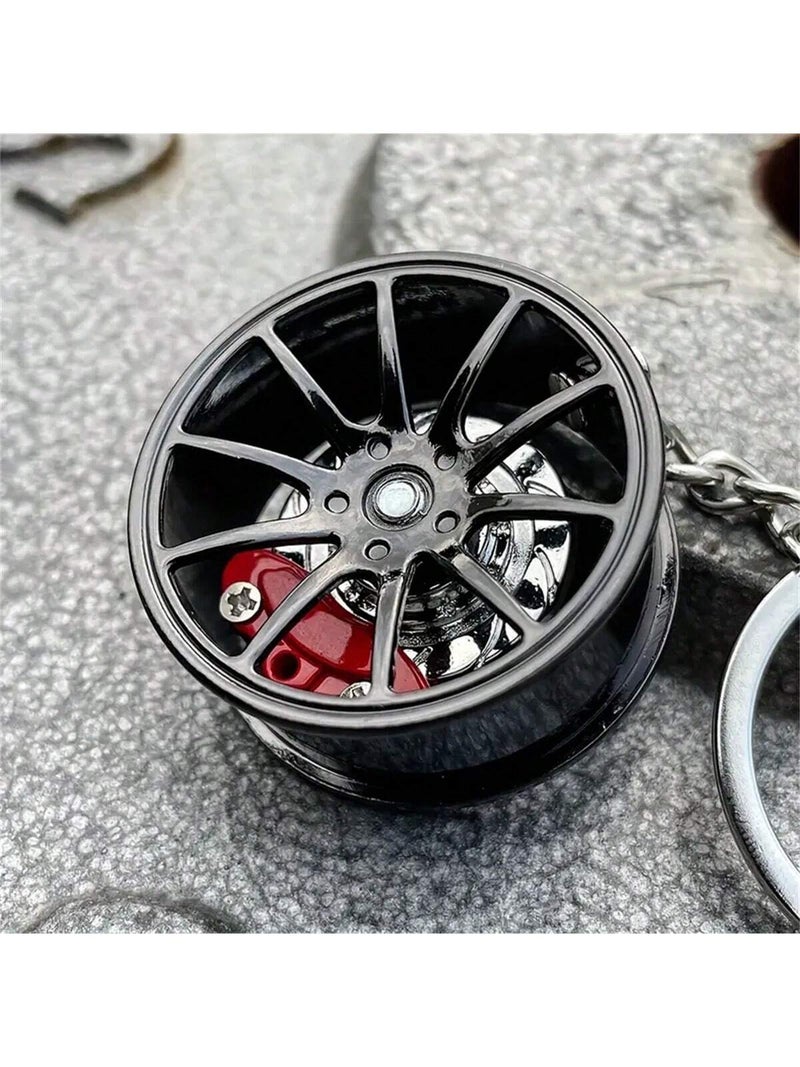 Metal Car Wheel Rim Keychain with Red Brake Caliper – Black Design for Car Enthusiasts - Image 1