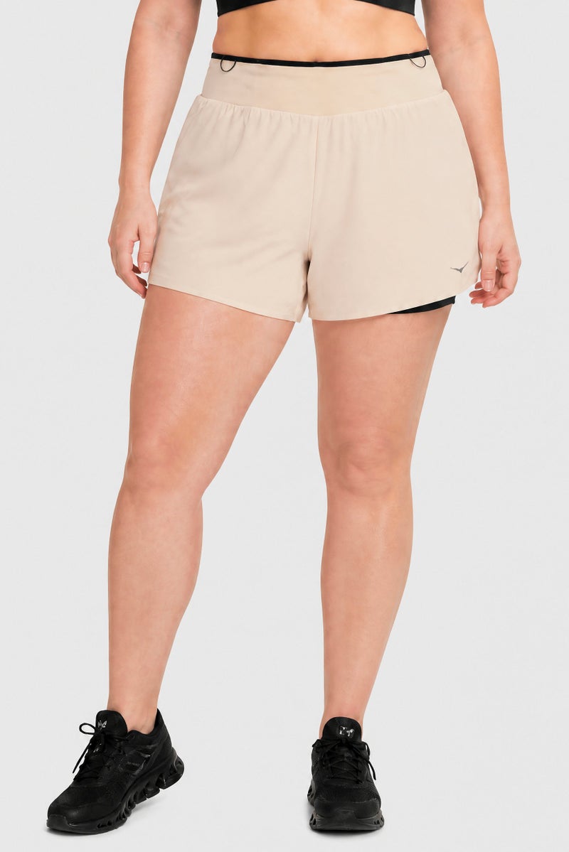 Hoka Women Sportswear Fit Training  Shorts, Beige - Image 1