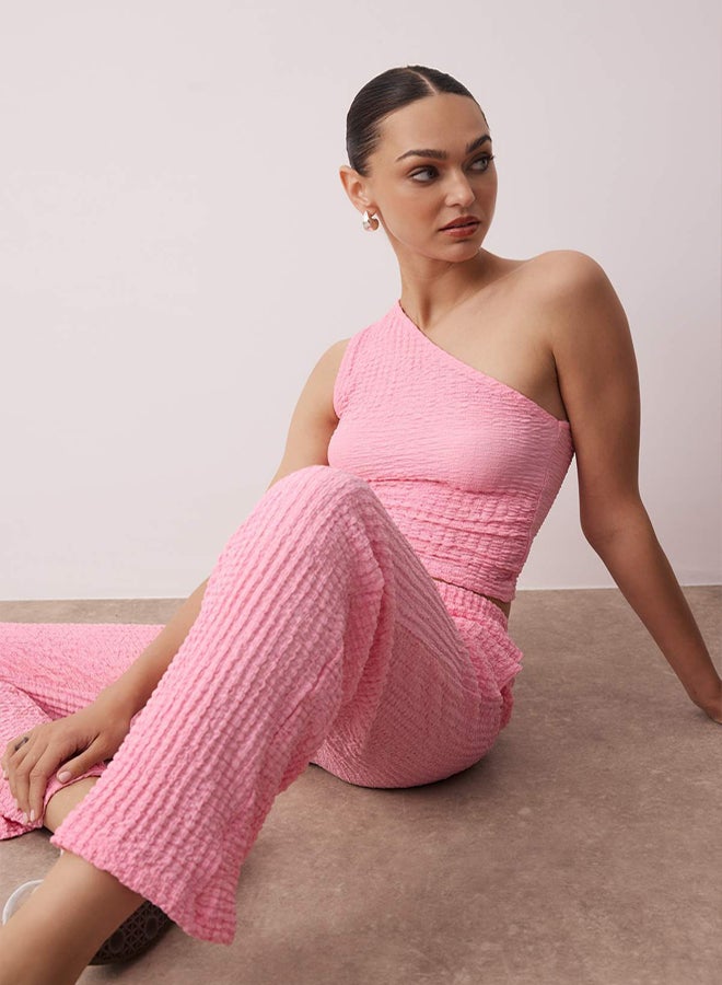 trendyol Pink Textured Seersucker Asymmetric Single Sleeve Stretch Knitted Bottom - Top Set - Image 1