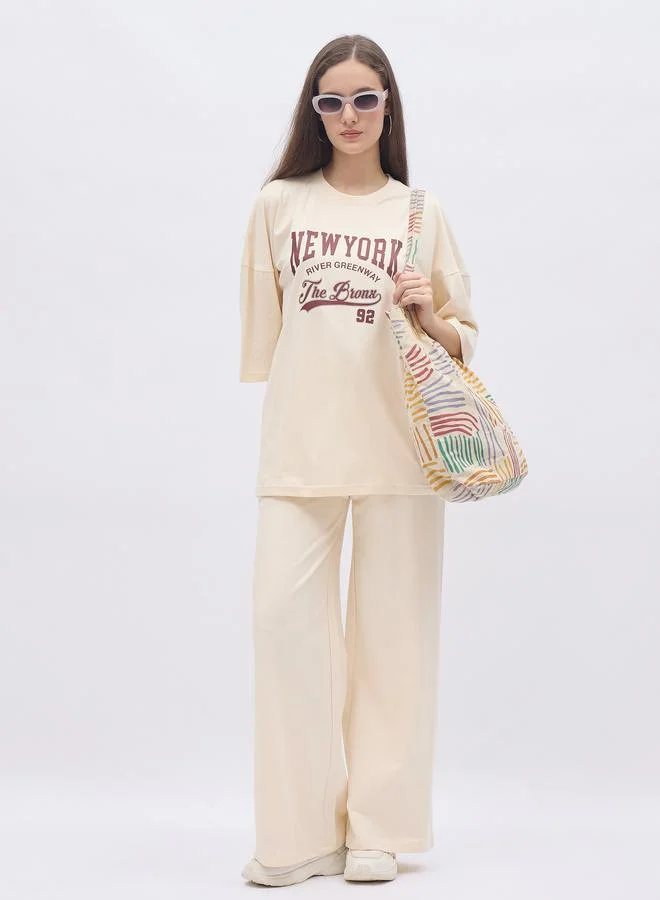 ستايلي Styli Cream NY Print Oversized T-Shirt and Wide Leg Joggers Co-Ords