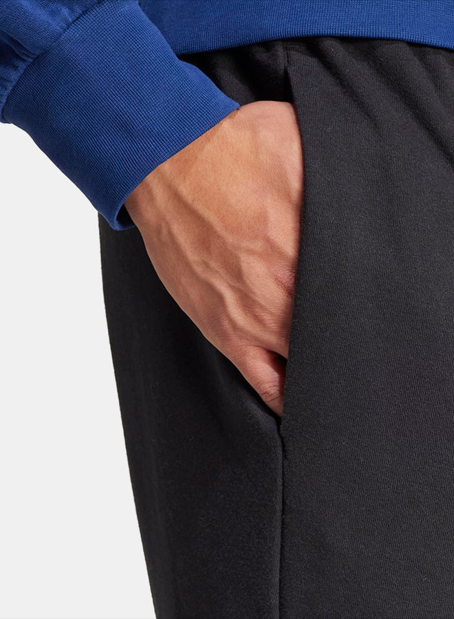 Adidas Essentials Feelcozy Fleece Cargo Joggers - Image 5