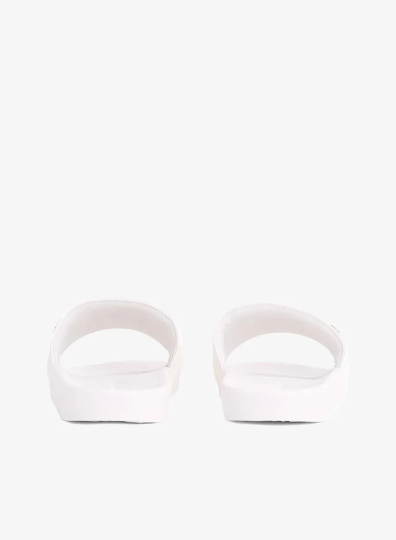Tommy Hilfiger  Embossed Monogram Pool Slides for Women | Best Price UAE