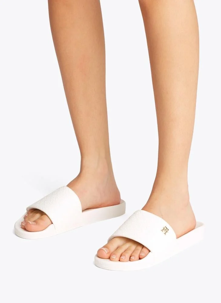 Tommy Hilfiger  Embossed Monogram Pool Slides for Women | Best Price UAE
