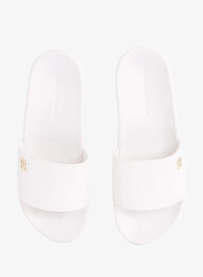 Tommy Hilfiger  Embossed Monogram Pool Slides for Women | Best Price UAE