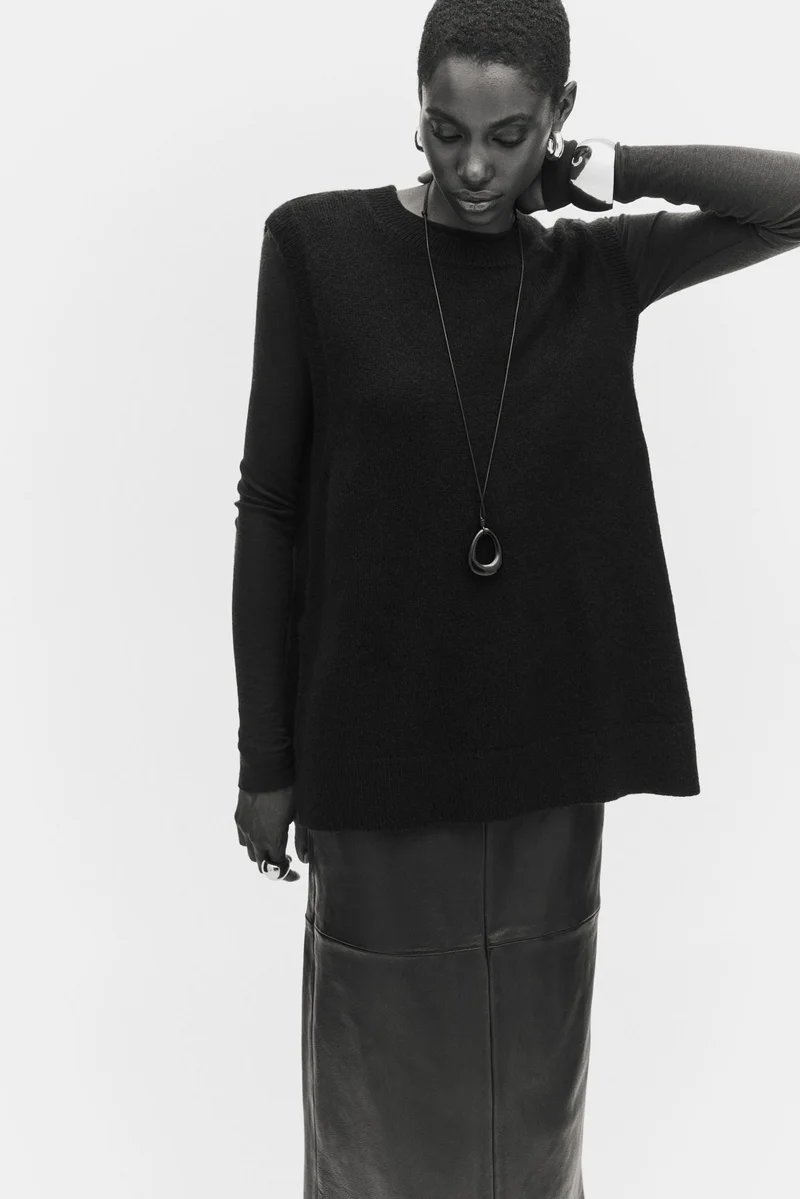 اتش اند ام سترة بدون أكمام