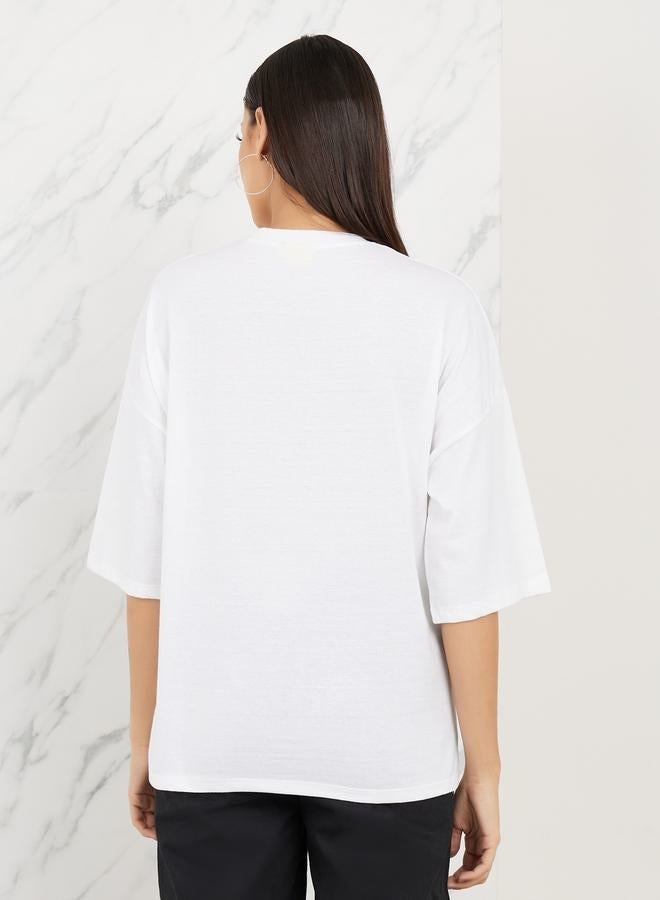 ستايلي تيشيرت واسع بطبعة جرافيك واكتاف منخفضة - Image 4