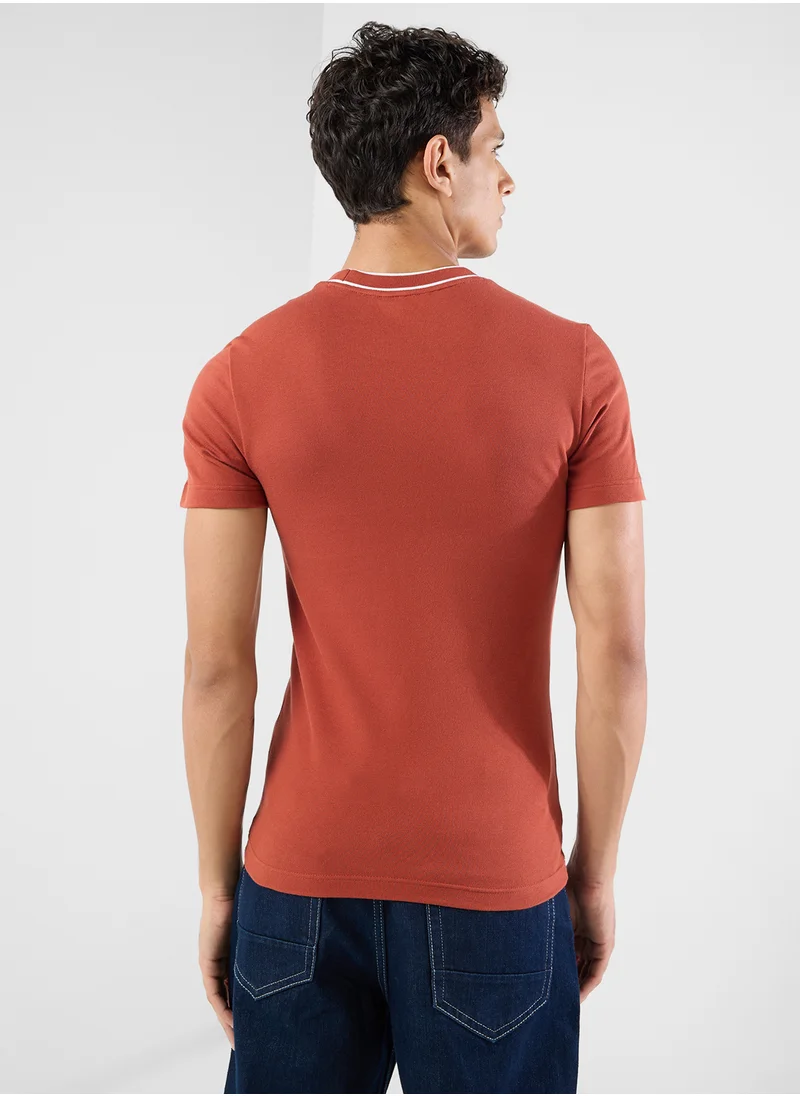 لاكوست Logo Graphic Crew Neck Short Sleeve T-Shirt