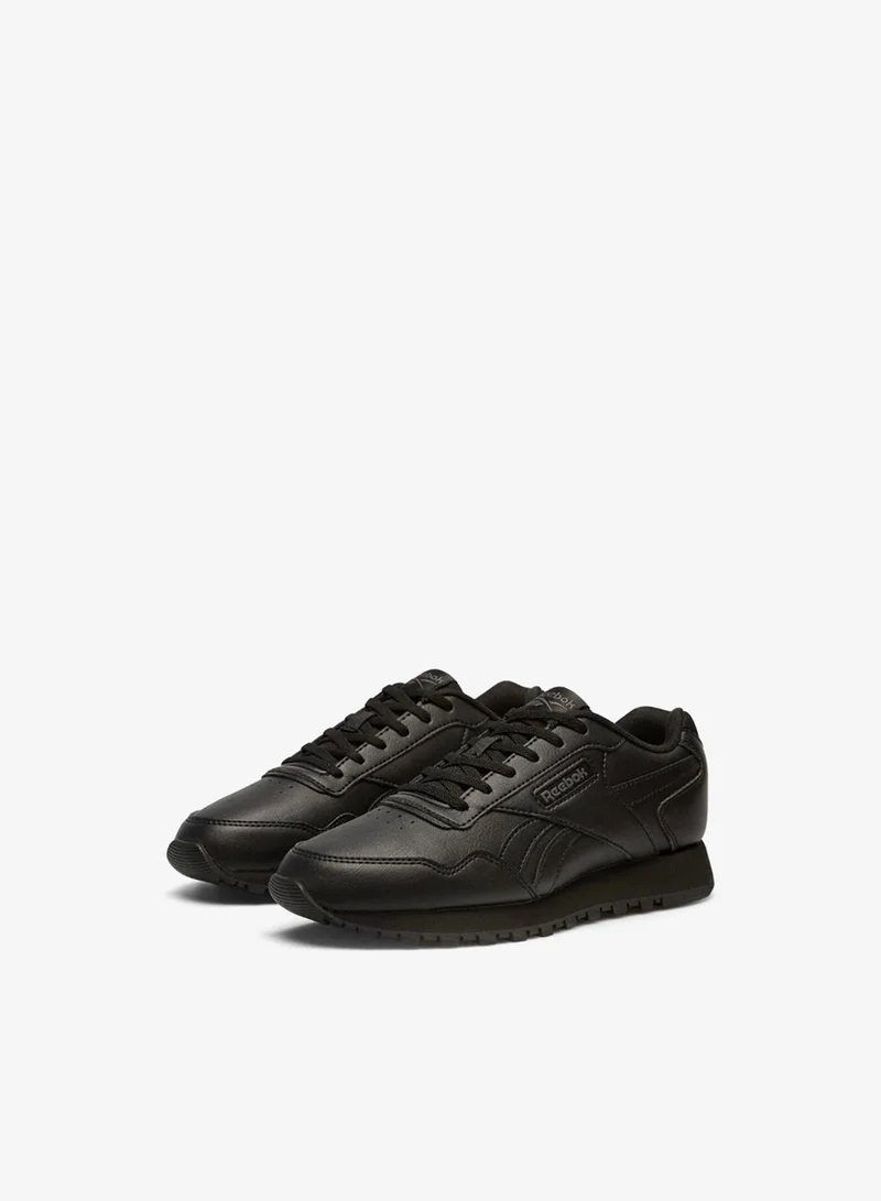 ريبوك Reebok Royal Glide men's shoes offer a stylish leather-synthetic build, soft cushioning, and grippy rubber soles perfect for all-day comfort and stability.