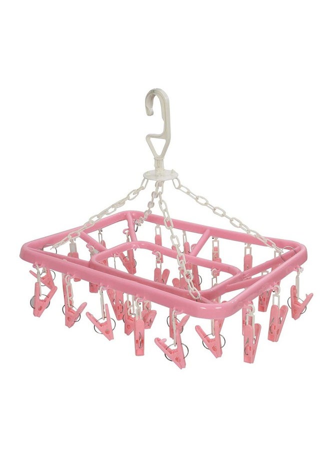 Kuber Industries Kuber Industries Baby Clothes Hanger Rack|360 Degree Portable & Rotatable Clips|32 Clips Cloth Drying Hanger|Space Saving Travel & Durable Plastic (Pink)  - Image 1