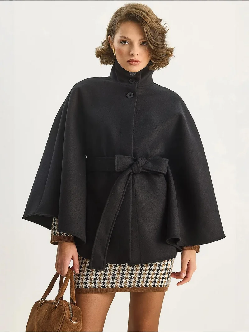 بيانكو لوتشي معطف بونشو من لوكسي مع إغلاق برباط