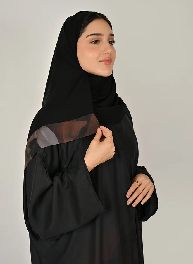 Hawraa Abaya Black and Brown Reversible Wrap Abaya with a Summer Design and Flowing Flared Silhouette