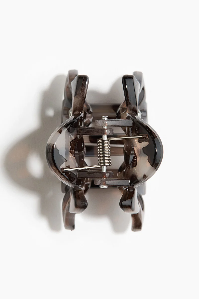 اتش اند ام مشابك شعر بشكل زهرة