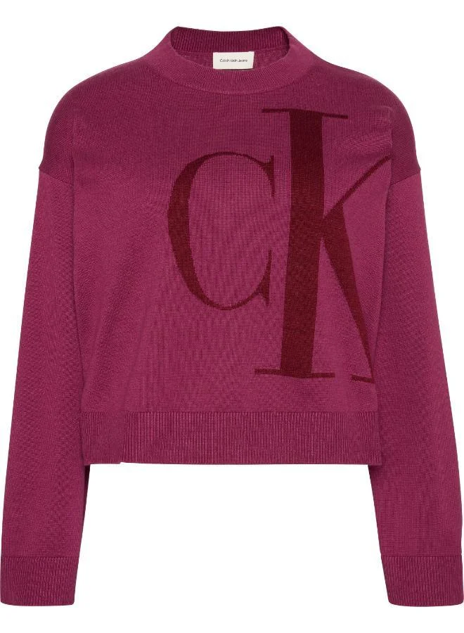 كالفن كلاين جينز كنزة بياقة دائرية برسومات