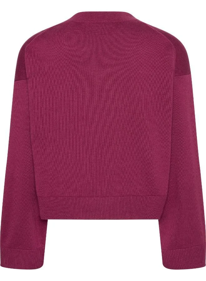 كالفن كلاين جينز كنزة بياقة دائرية برسومات