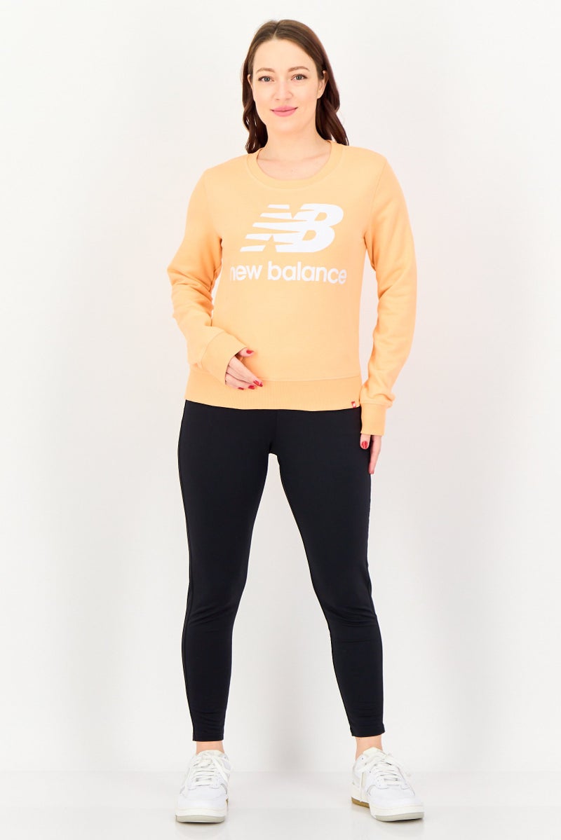 New Balance Women Relaxed Fit Long Sleeve Outdoor Sweatshirt, Peach - Image 4