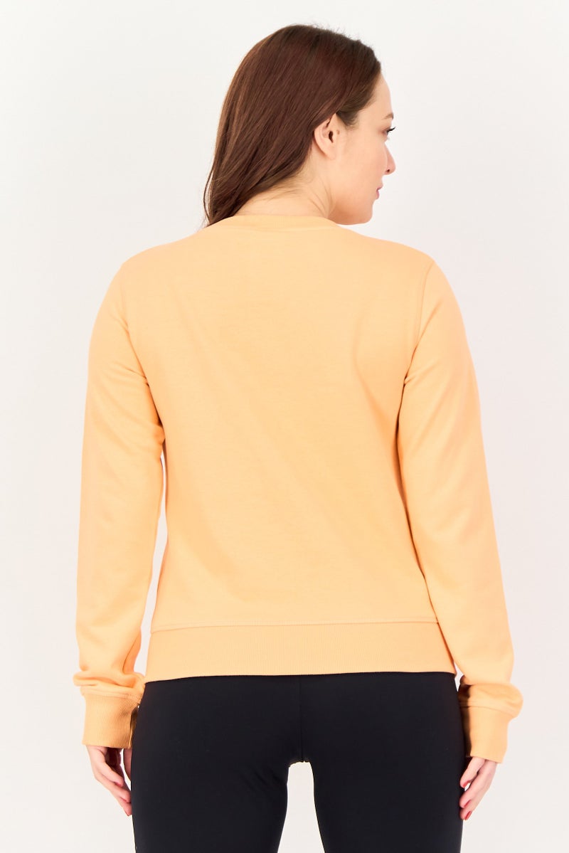 New Balance Women Relaxed Fit Long Sleeve Outdoor Sweatshirt, Peach - Image 2