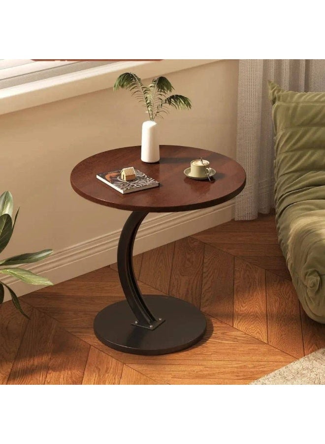 C-shaped side table with a round top and metal legs - Image 2