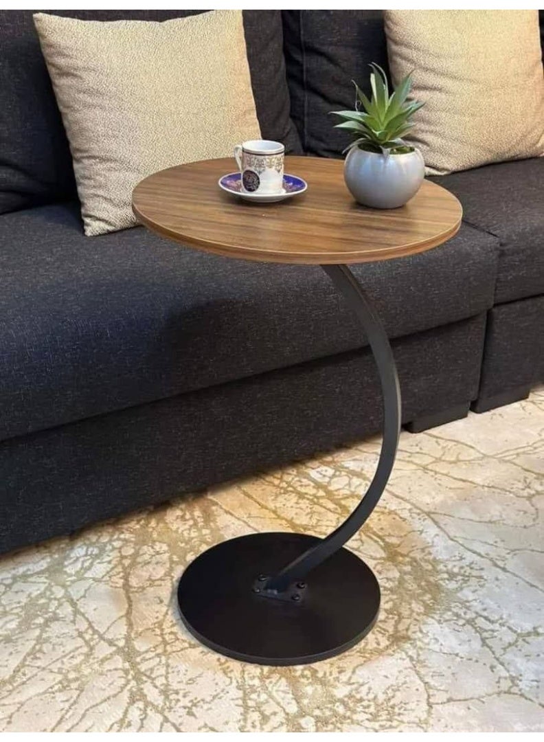 C-shaped side table with a round top and metal legs - Image 4